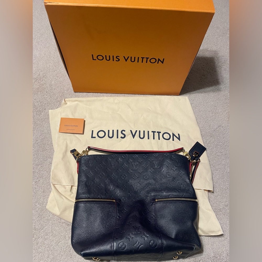Preowned Louis Vuitton Miele bag in marine rouge.